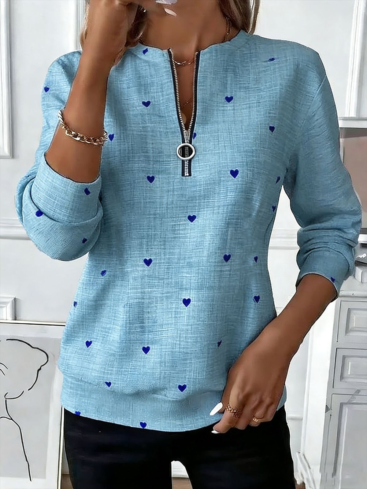 Women's long-sleeve pullover sweatshirt with festive trendy patterns.