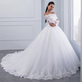 ROBE DE MARIÉE DENTELLE QUEUE LONGUE BRIDE – IVOIRE BLANC CHAMPAGNE