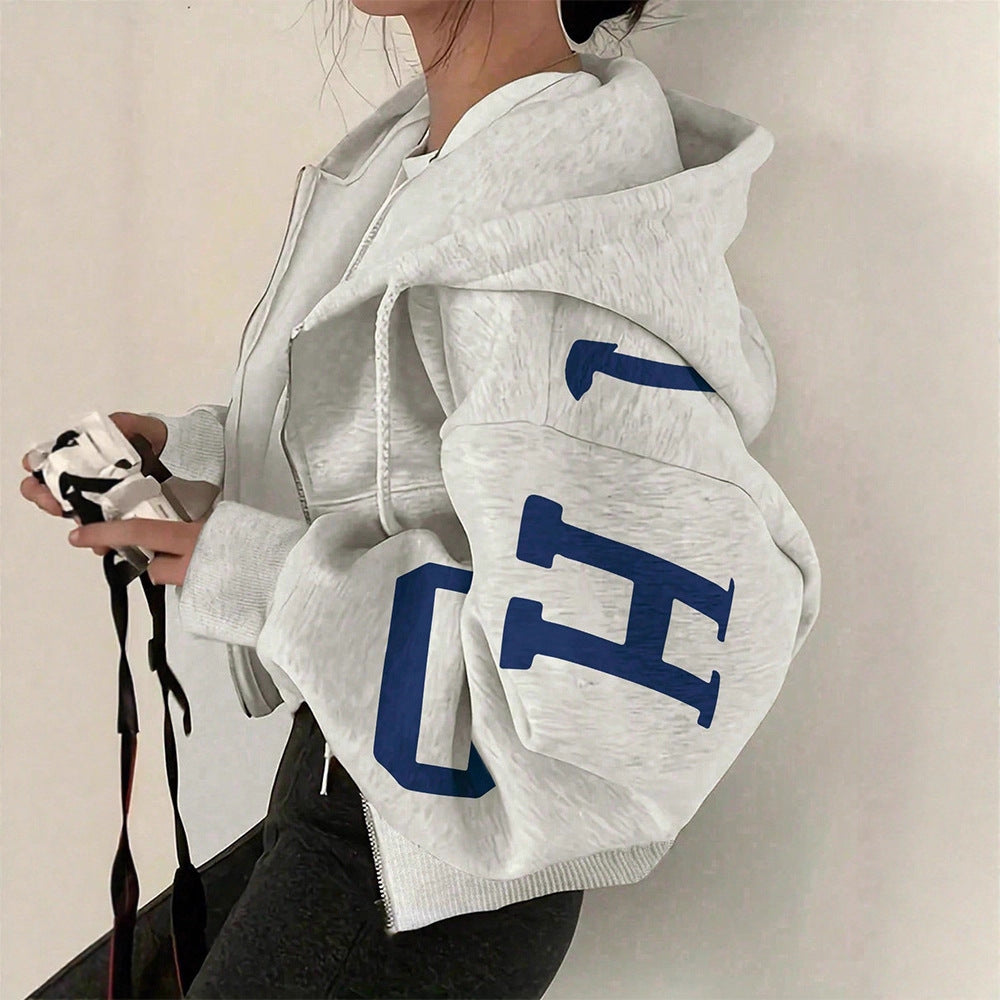 Sudadera casual con cremallera y mangas largas estampada, estilo relajado y moderno.