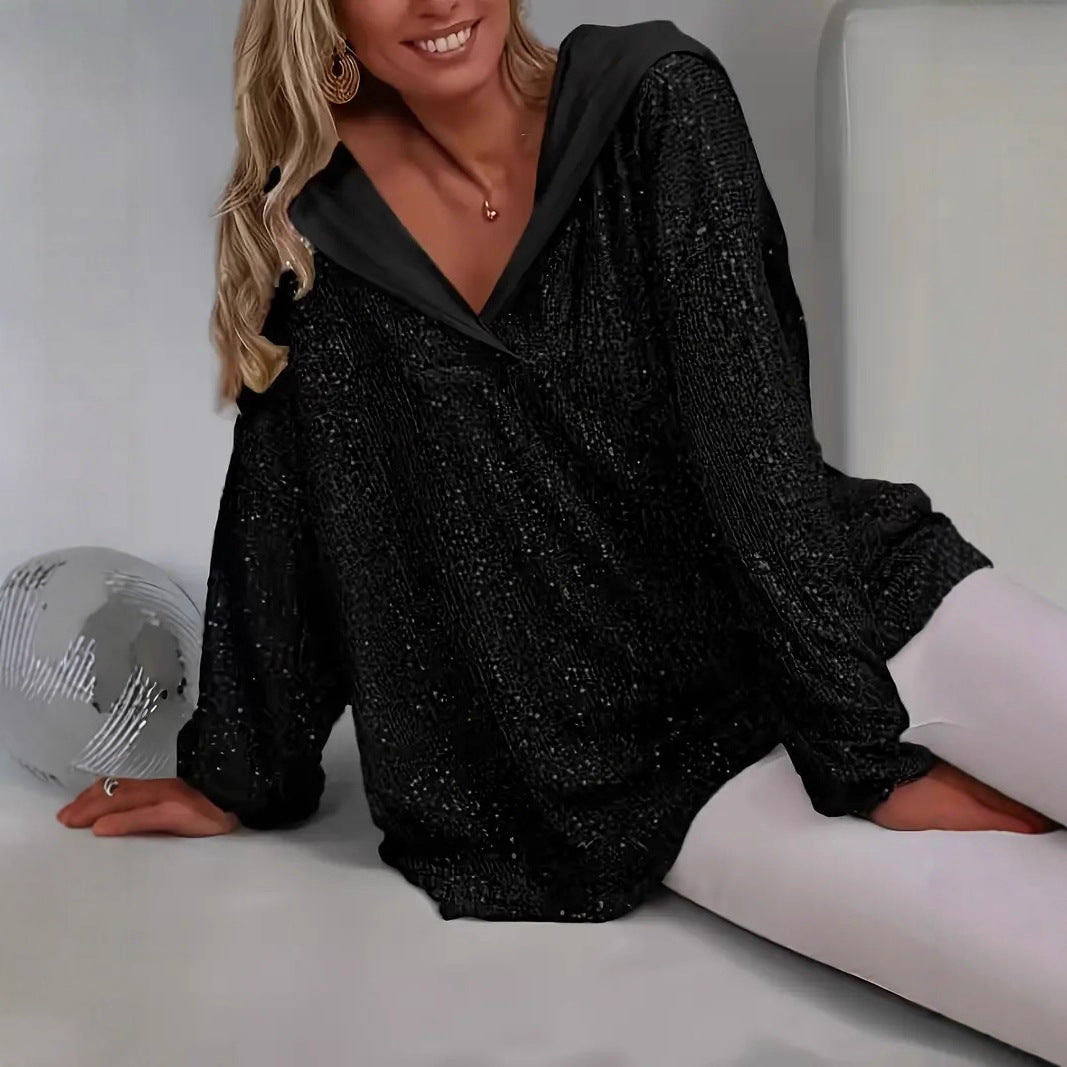 Hoodie oversize femme à sequins brillants. Coupe ample confortable pour soirées ou casual chic.