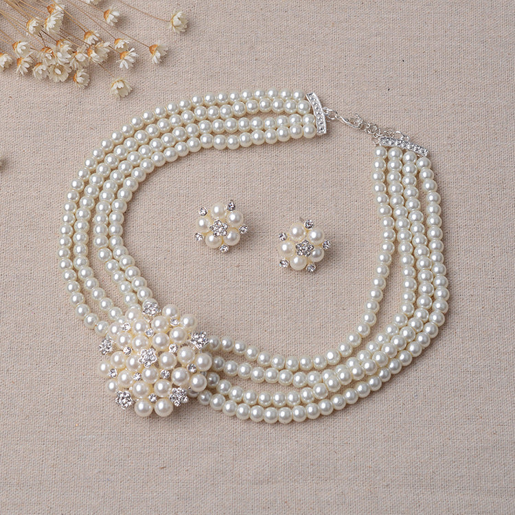 Set bijoux mariage TL060 – Chaîne de mariée luxueuse perles & fleurs + boucles d’oreilles