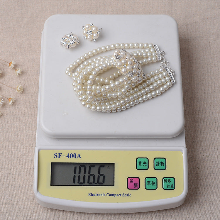 Set bijoux mariage TL060 – Chaîne de mariée luxueuse perles & fleurs + boucles d’oreilles
