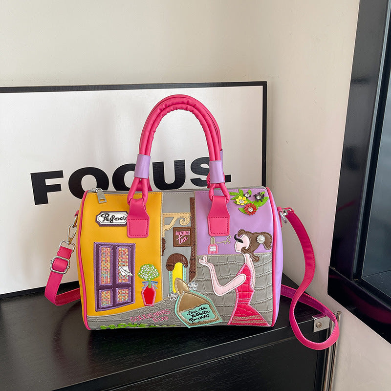 Sac Boston luxe grande contenance avec patchwork brodé artisanal.