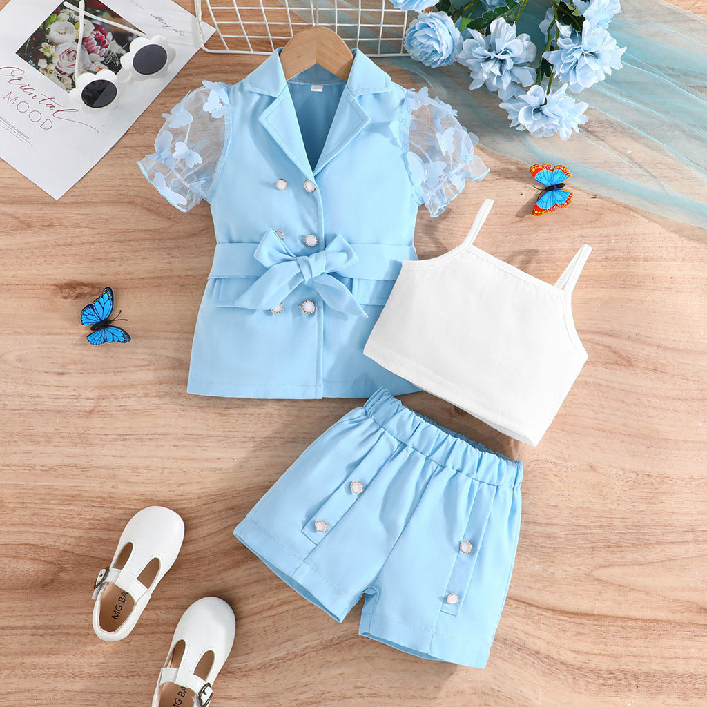 Ensemble trois pièces pour fille : haut, barboteuse, pantalon.