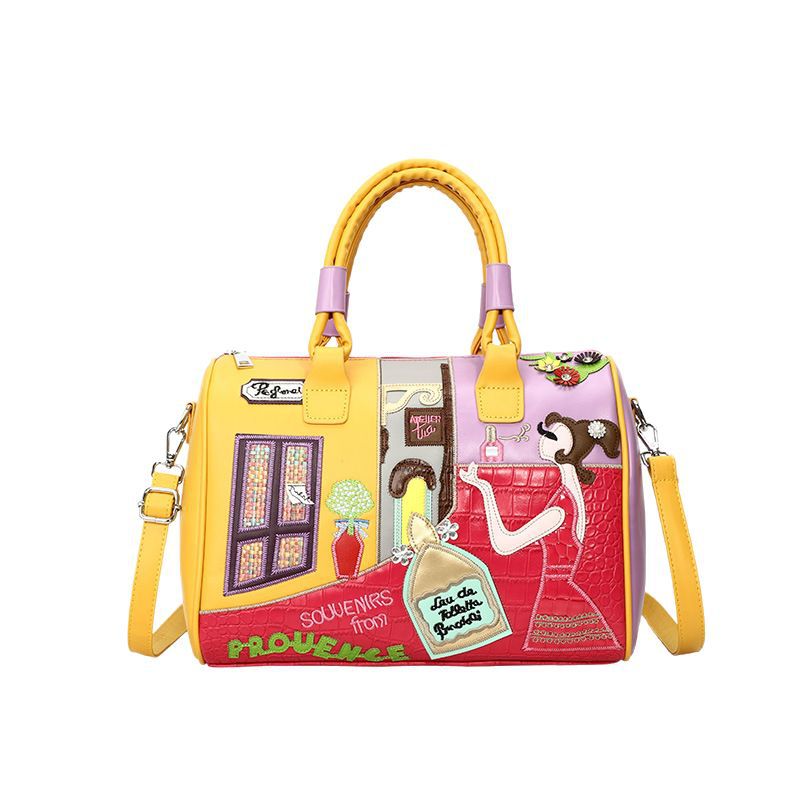 Sac Boston luxe grande contenance avec patchwork brodé artisanal.