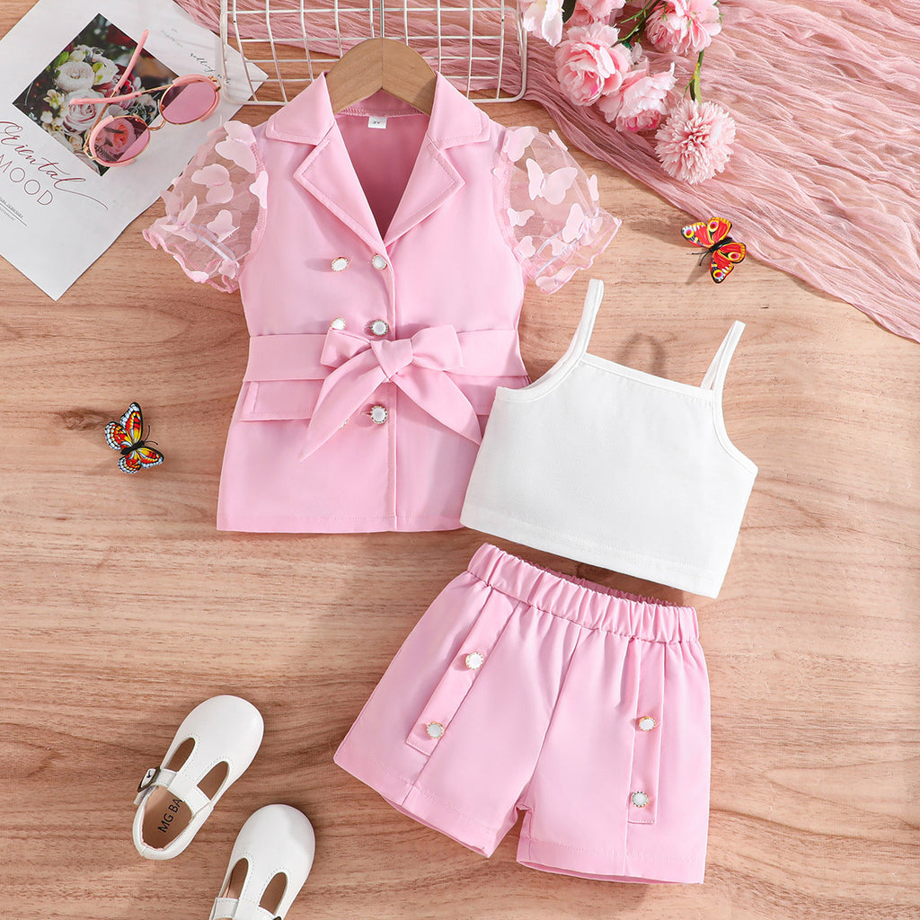 Ensemble trois pièces pour fille : haut, barboteuse, pantalon.