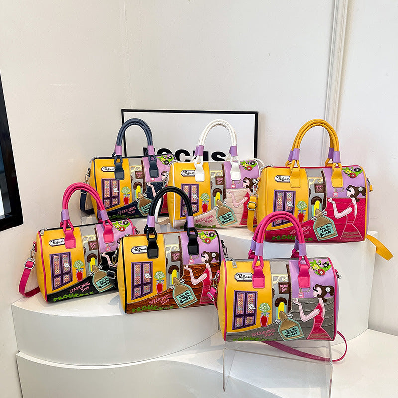 Sac Boston luxe grande contenance avec patchwork brodé artisanal.