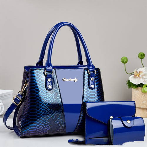 Sac bandoulière grande capacité avec cabas assorti motif peau de serpent.