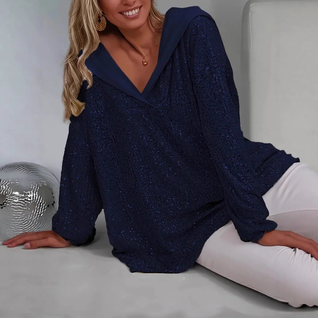 Hoodie oversize femme à sequins brillants. Coupe ample confortable pour soirées ou casual chic.