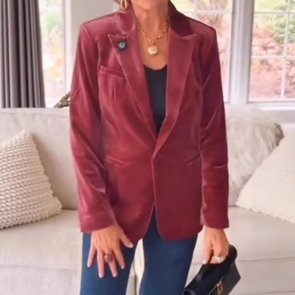 Veste costume velours gold coupe ajustée, style professionnel luxueux.